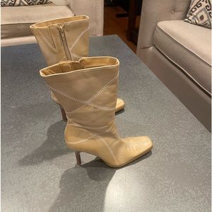 BP. Cream-colored heeled boots.